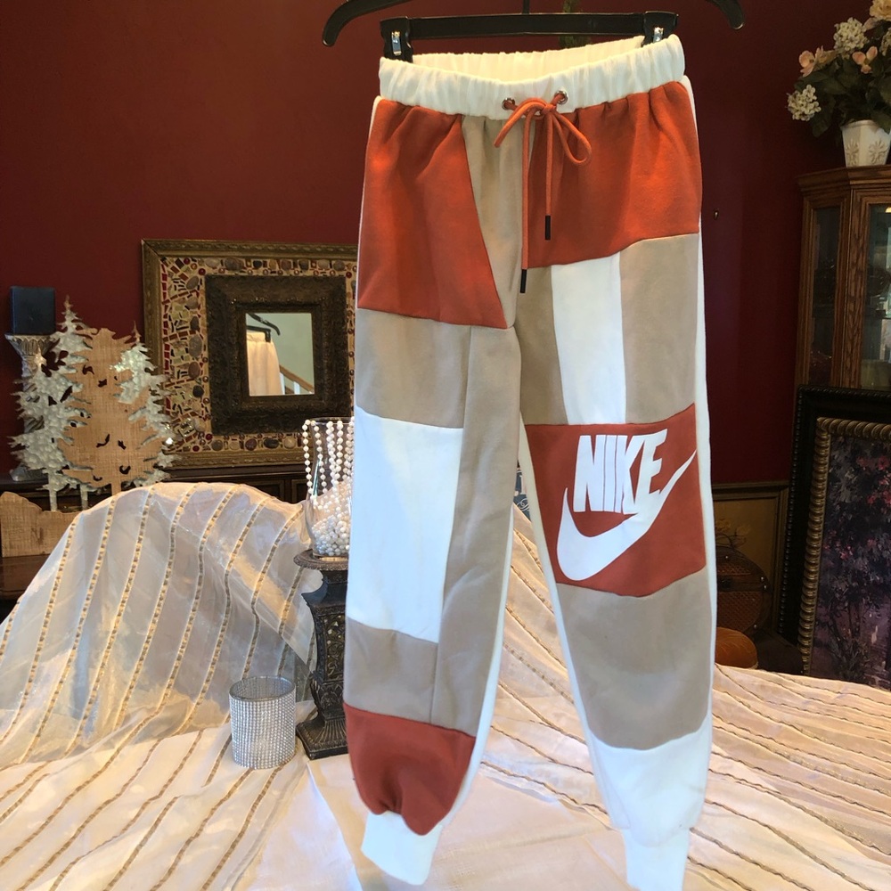Nike Patchwork Jogger Pants in Orange, Beige & White size small EUC